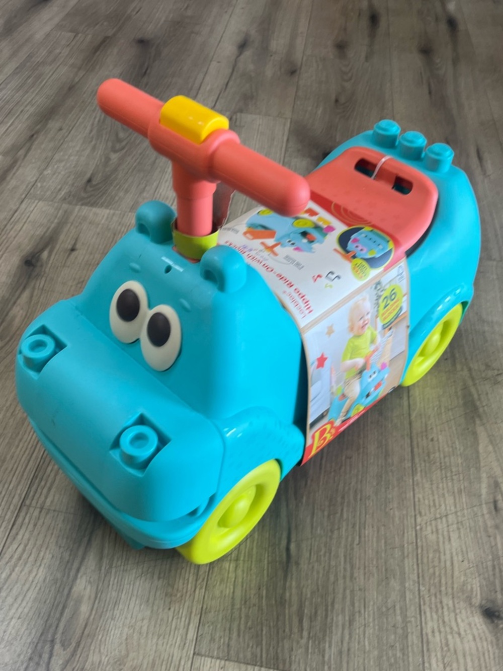 B. Toys Locbloc Hippo Ride-On With Blocks